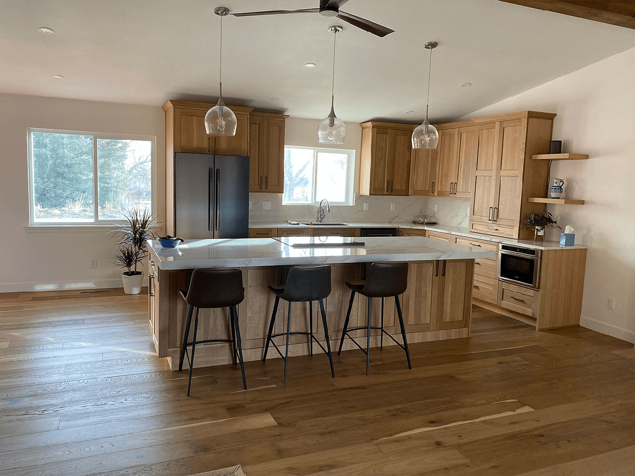Living room remodel with open staircase