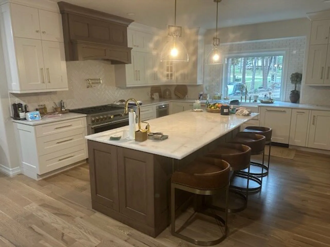 Traditional kitchen remodel with bronze pendant lighting