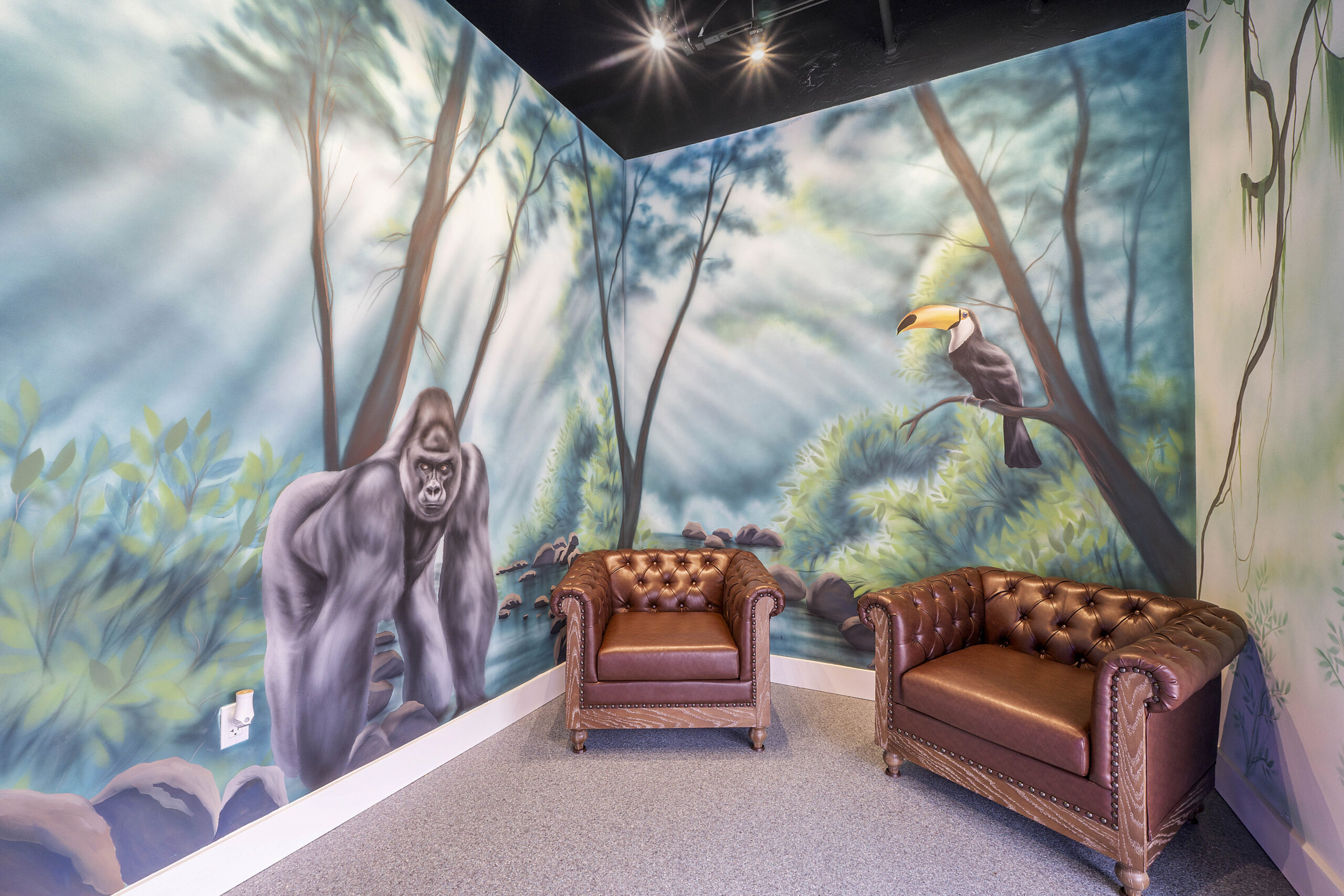 Jungle-themed lounge inside Boca Tanning Club's Boynton Beach salon