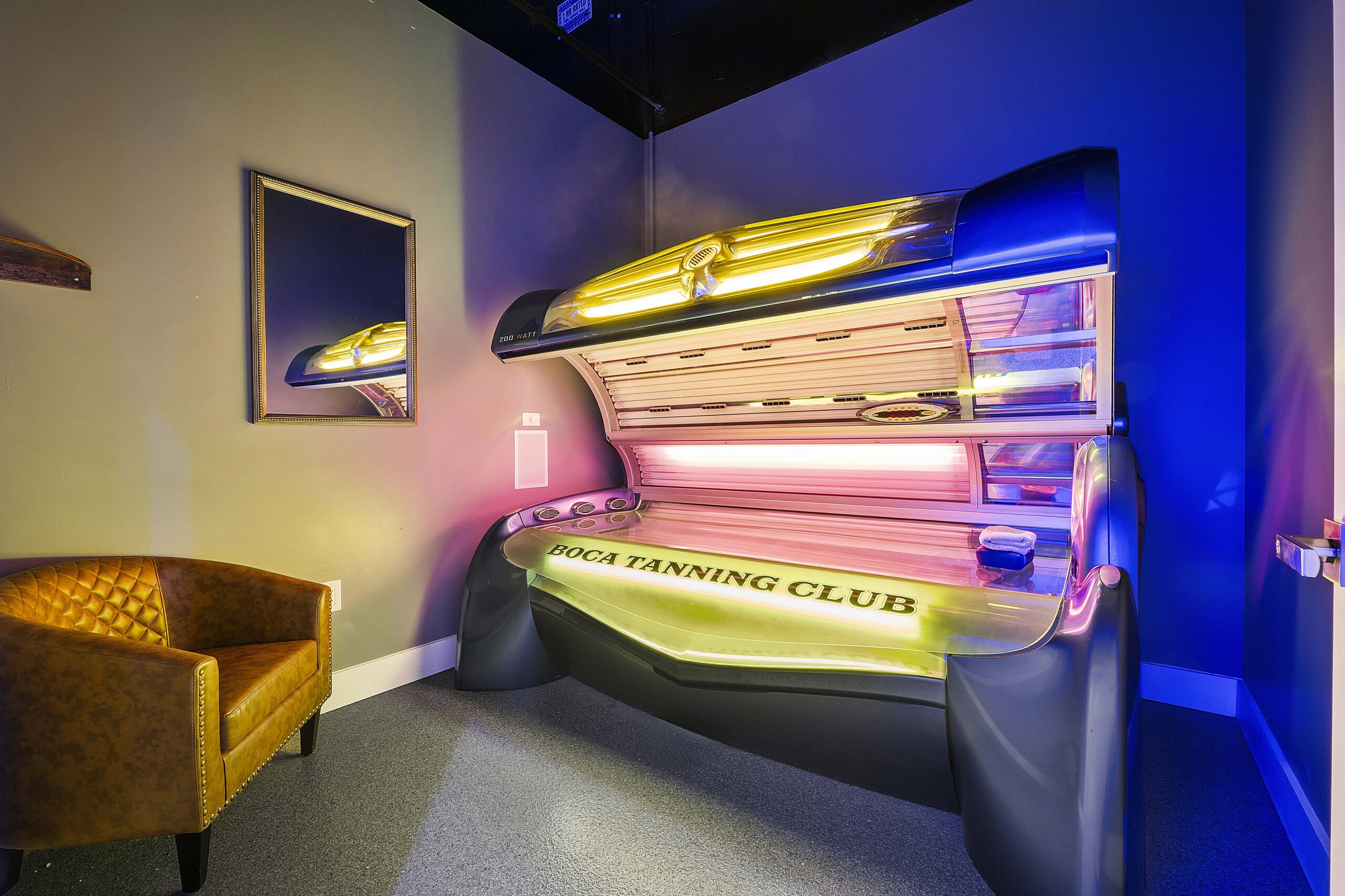 Lay down tanning bed with built-in Red Light Therapy at Boca Tanning Club's Boynton Beach salon