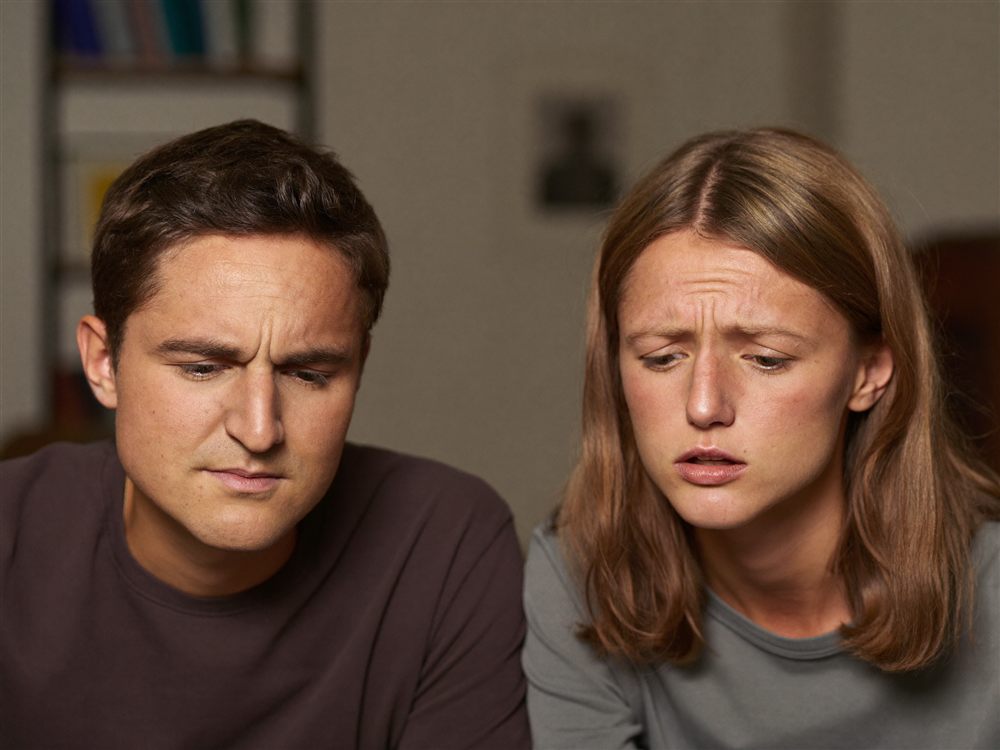 Couple overwhelmed trying to understand confusing loan paperwork