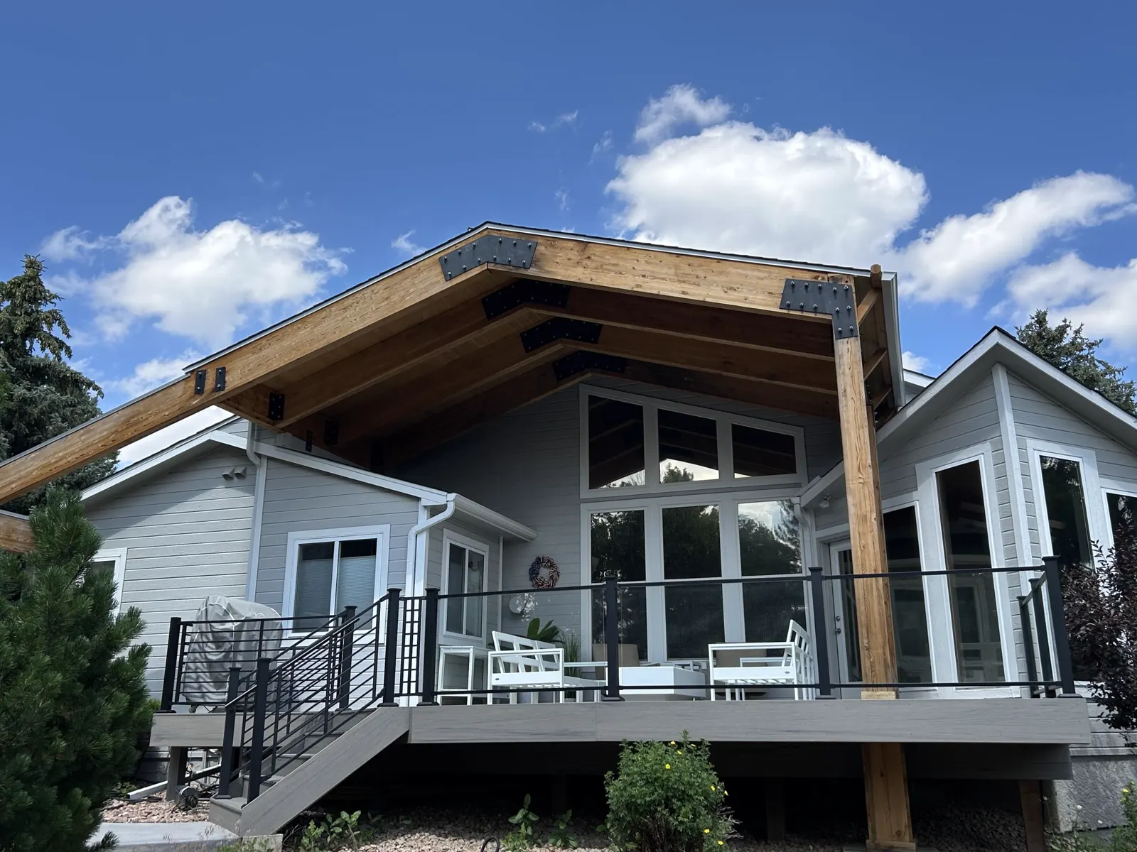 Vaulted timber-frame porch addition under construction