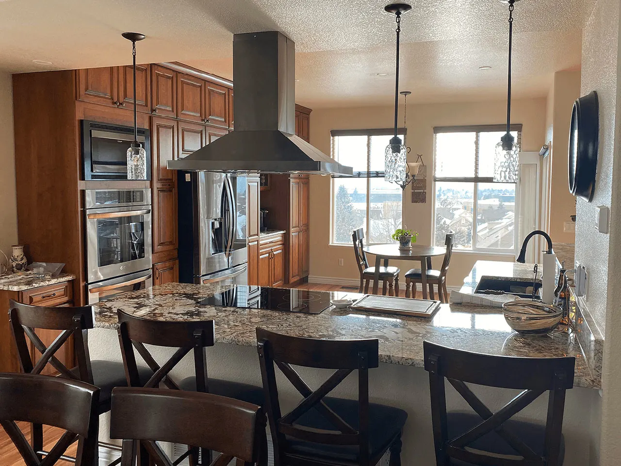 Modern kitchen with vaulted ceiling and skylights