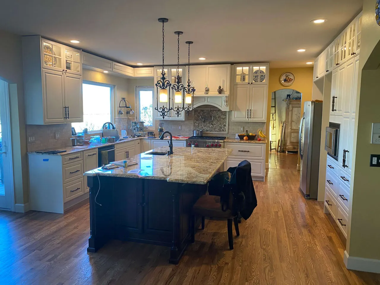 Custom kitchen remodel with statement chandelier