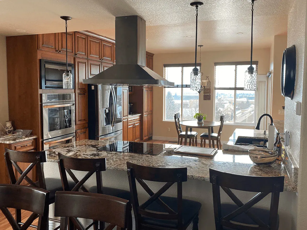 Modern kitchen with vaulted ceiling and skylights