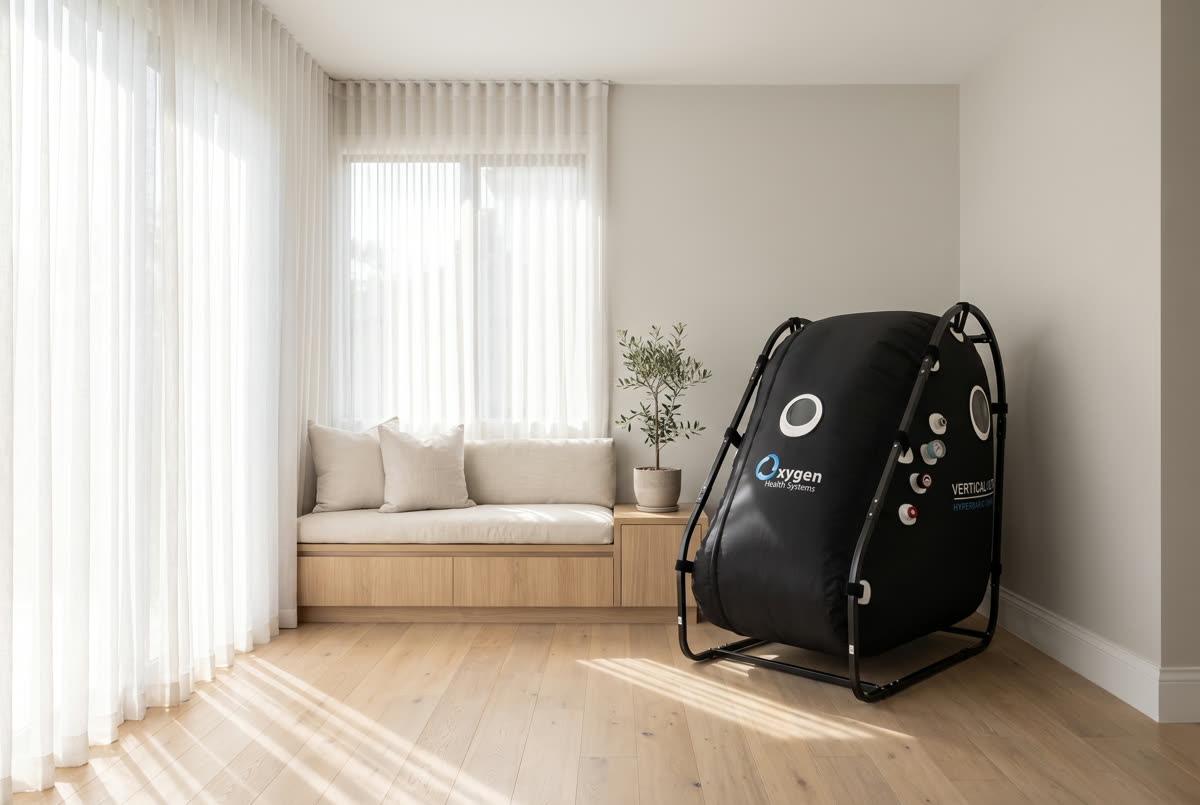 Sitting-style hyperbaric chamber installed in a modern Atlanta-area home wellness room