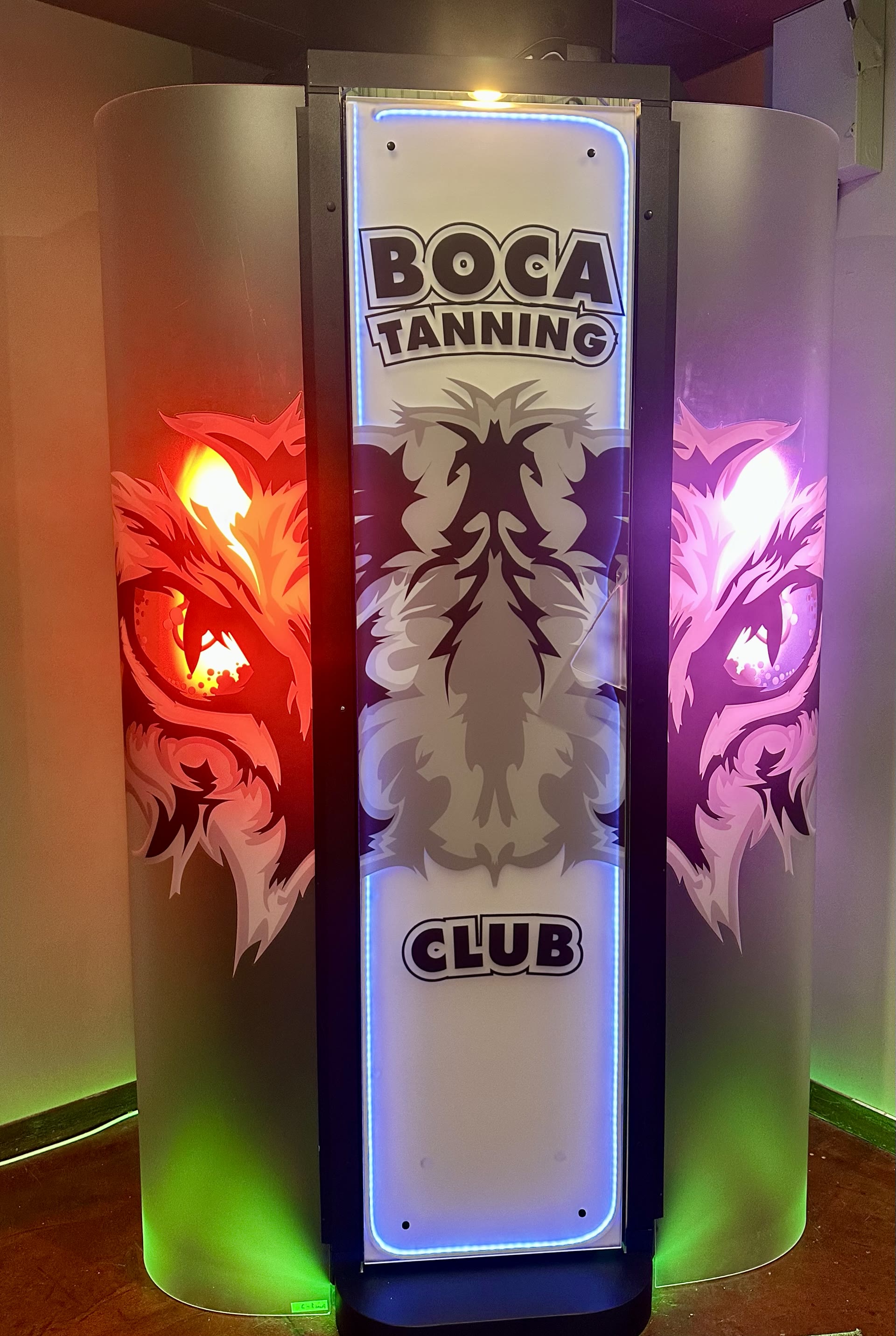 Stand-up UV tanning booth at Boca Tanning Club's East Boca salon