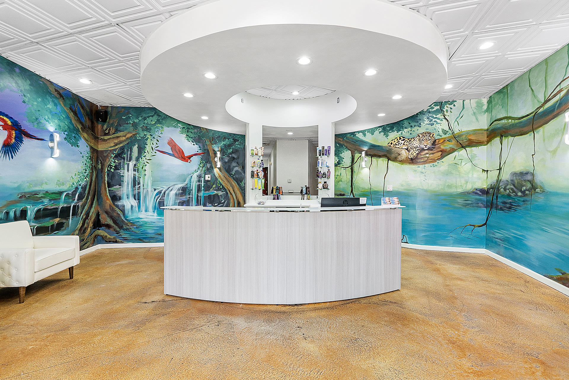 Inside the jungle-themed lobby of Boca Tanning Club's Coral Springs salon