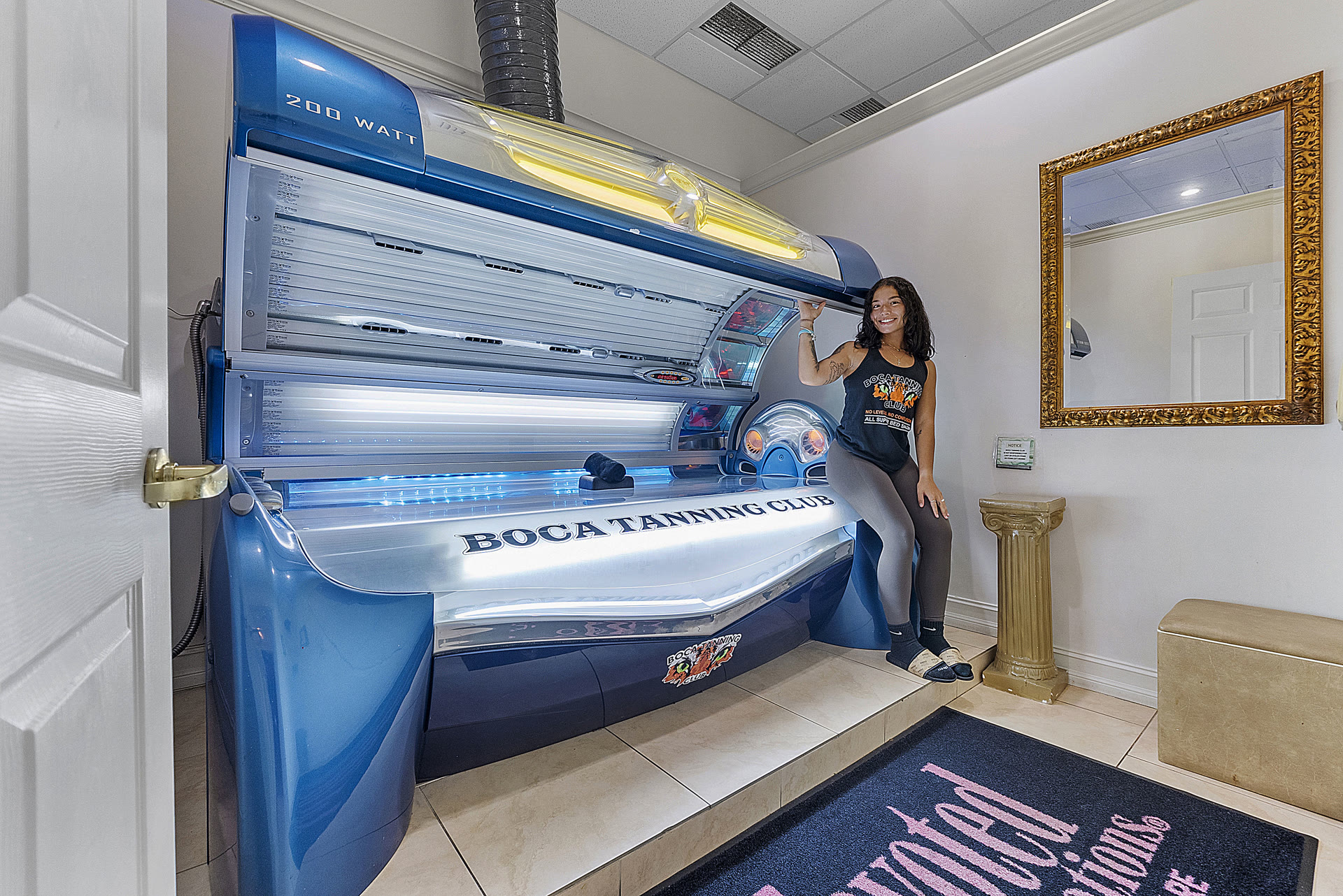Laydown UV tanning bed inside the Boca Tanning Club Pompano Beach salon