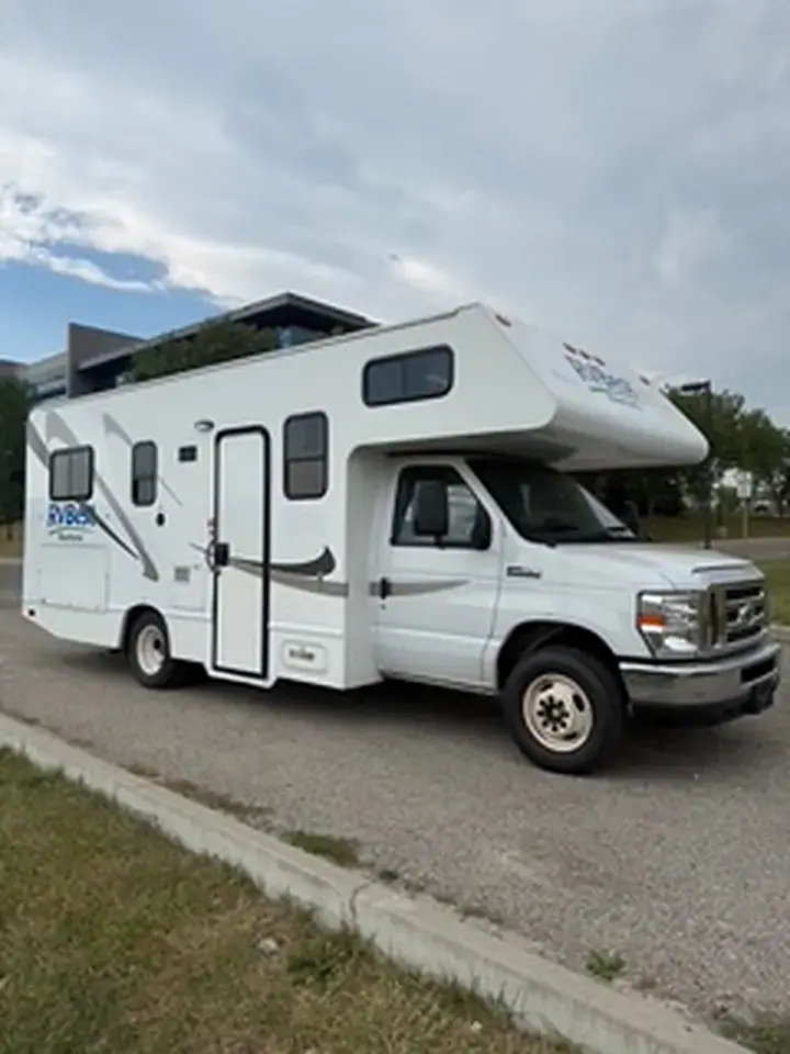 RV Best Rentals Class C motorhome parked in Alberta