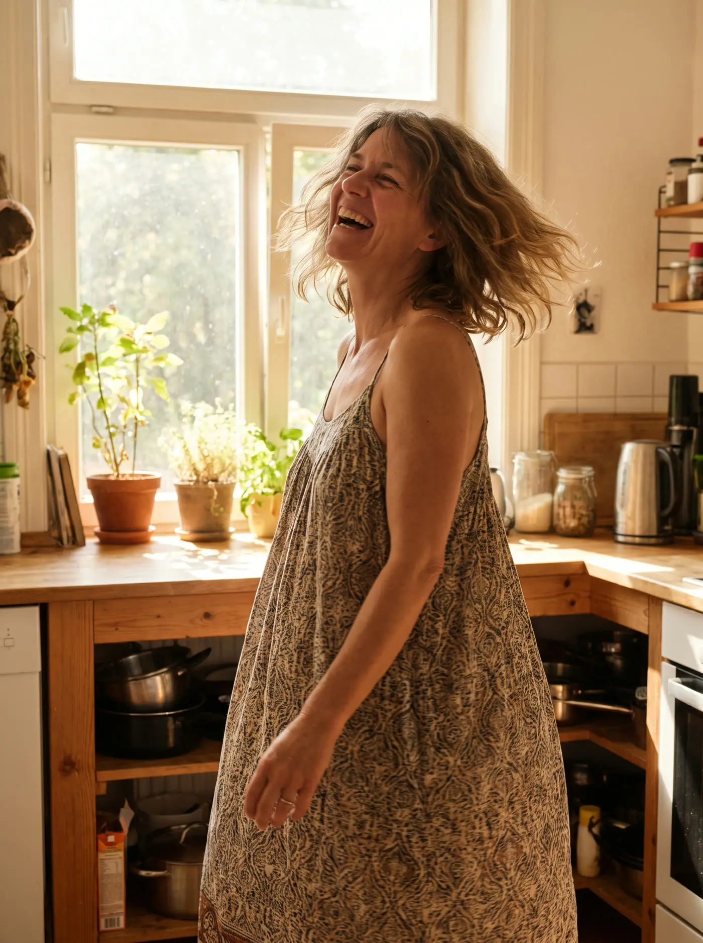 A woman dancing in her kitchen