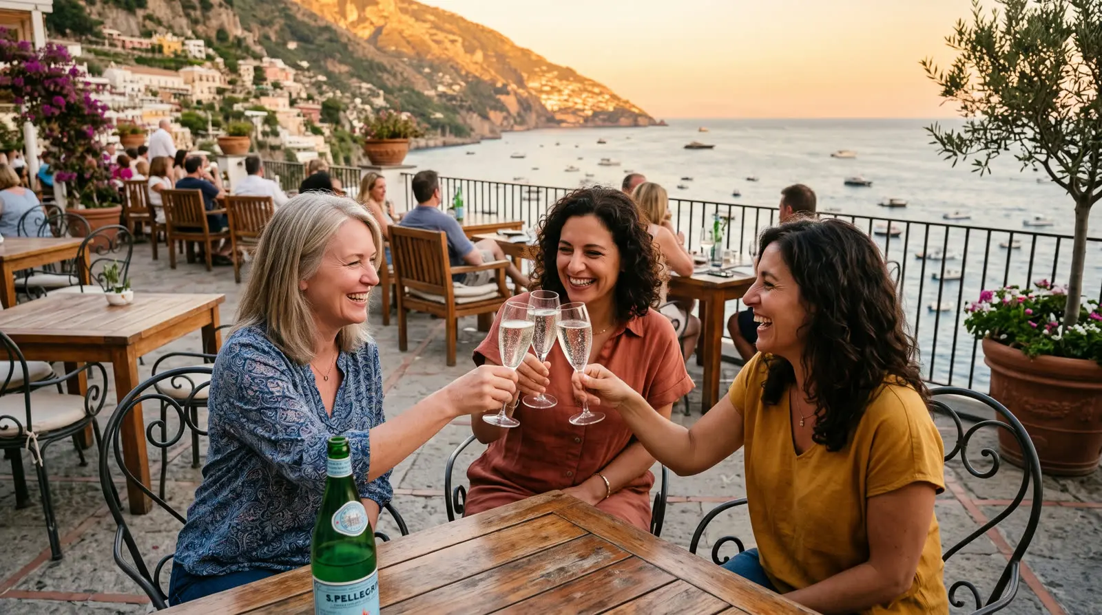 Friends toasting on a terrace at golden hour