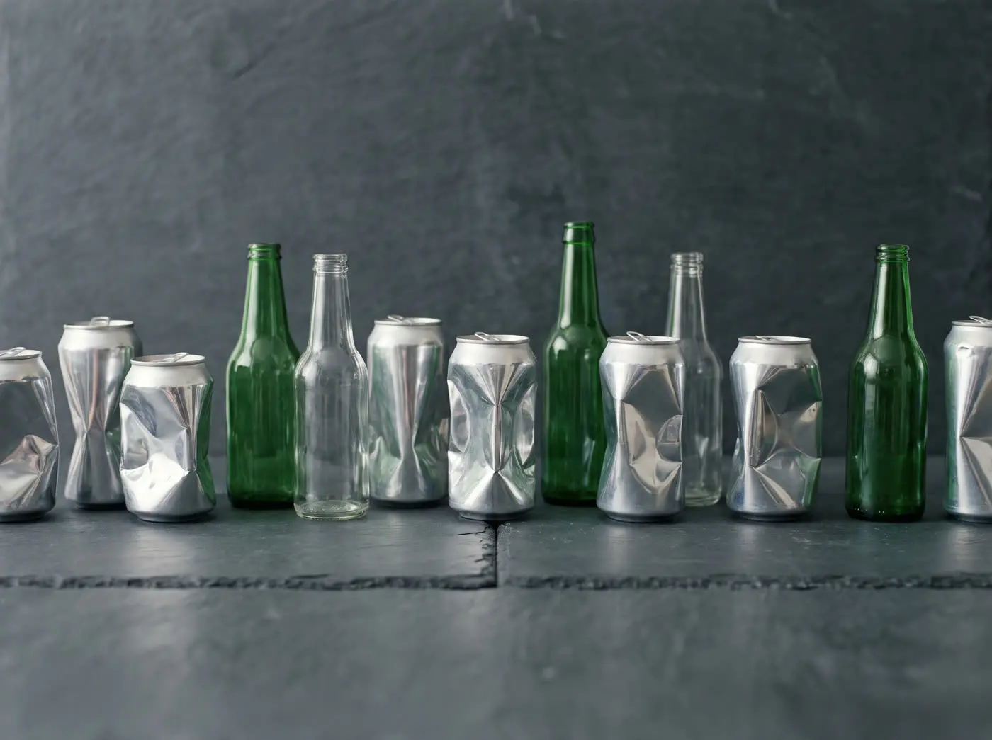 Aluminum cans and glass bottles ready for recycling